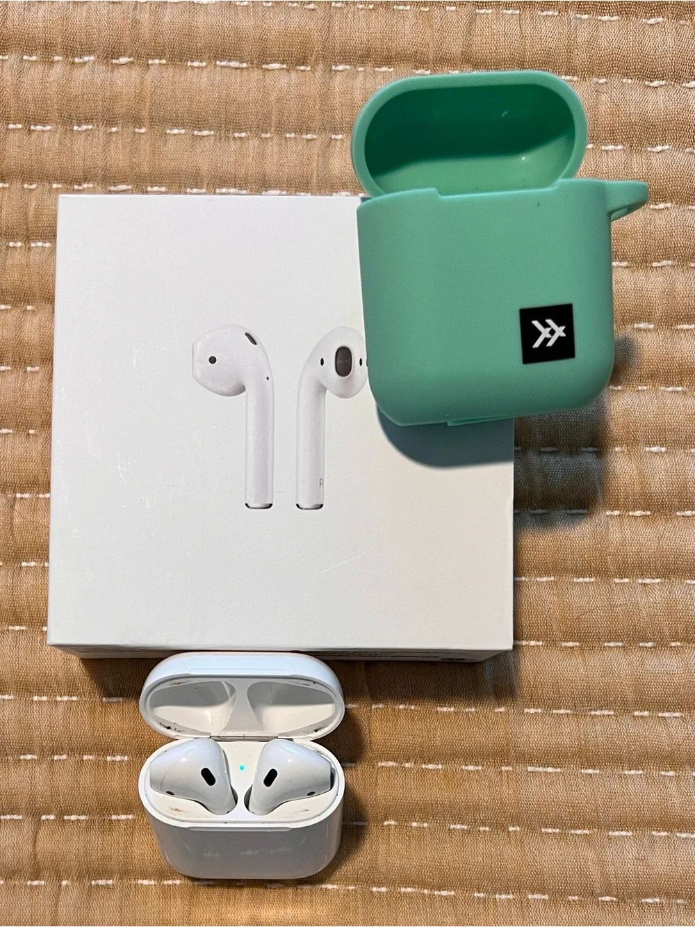 Apple AirPods Gen 2 with White Case and Mint Green Silicone Cover